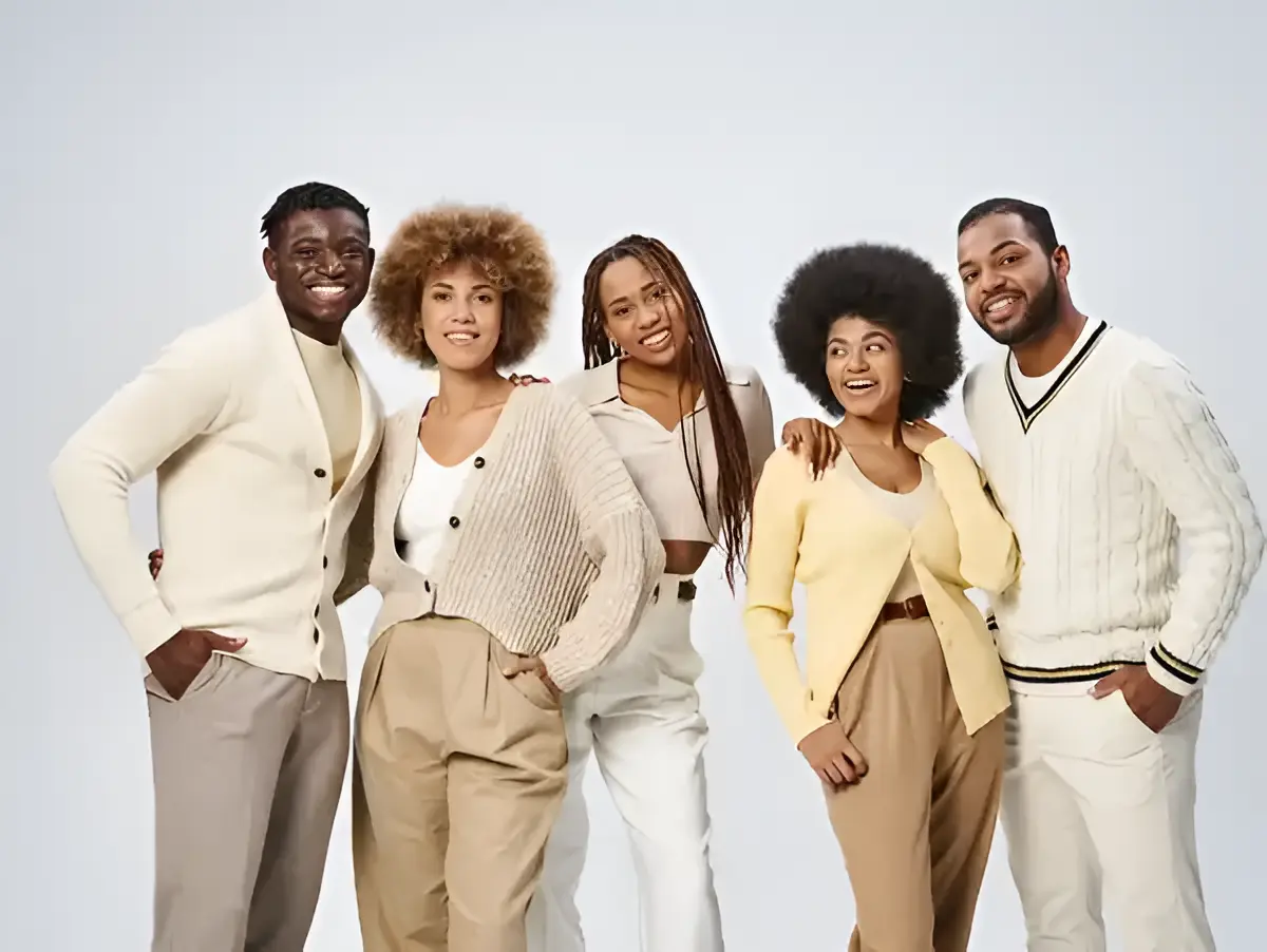 Group of people smiling in casual attire.